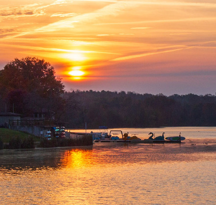 a sunset over a lake