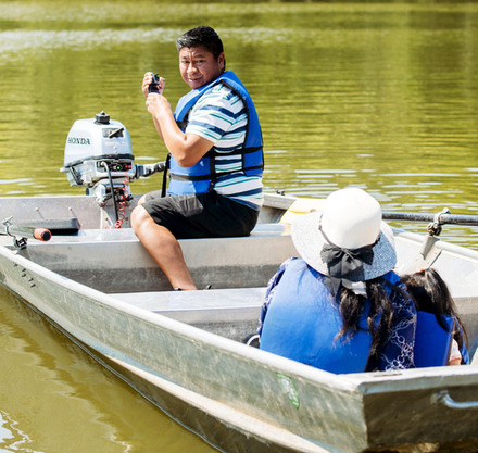 a man in a boat on water