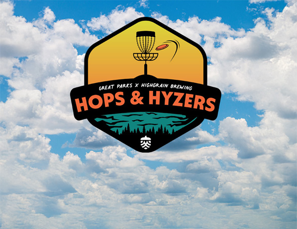 a logo with clouds in the background