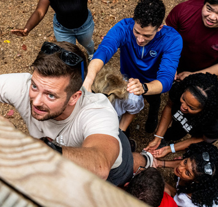 a man holding a person's head