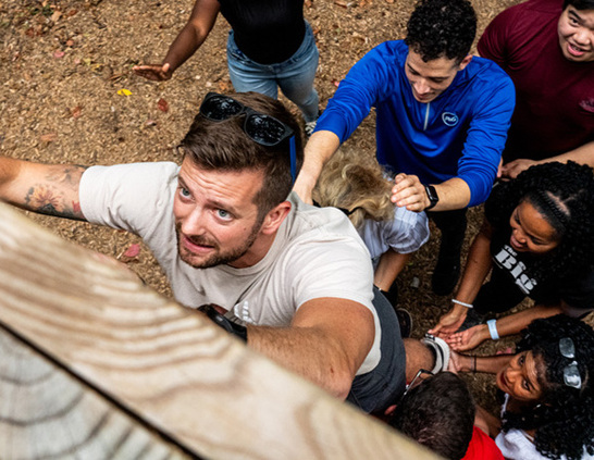 a man holding a person's head