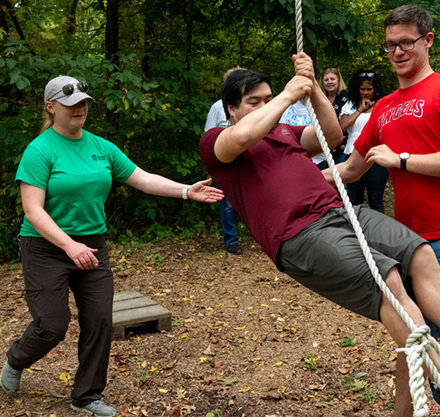 a man pulling a rope