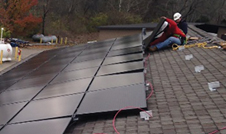 a man working on a roof