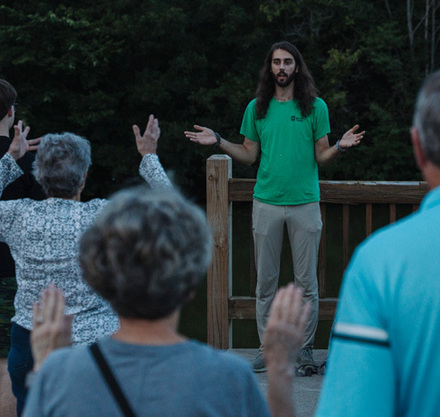 a man standing in front of a group of people