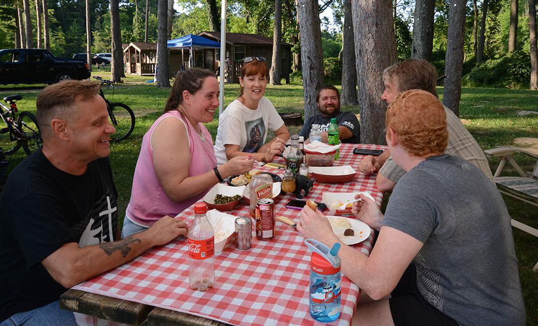 a group of people sitting at a table