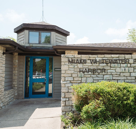 a stone wall with a sign on it