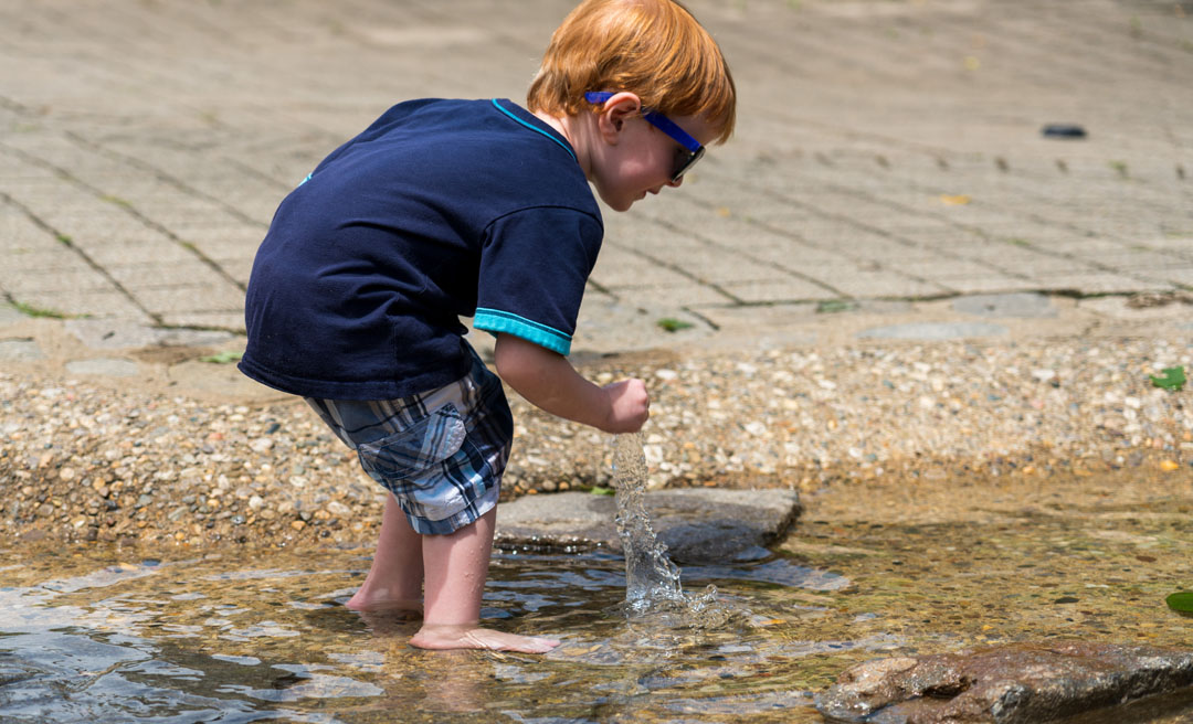 a child playing in water