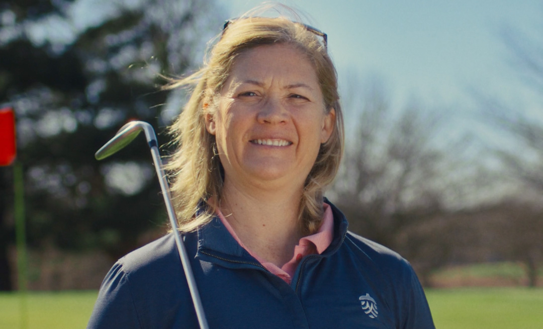 a woman smiling at camera