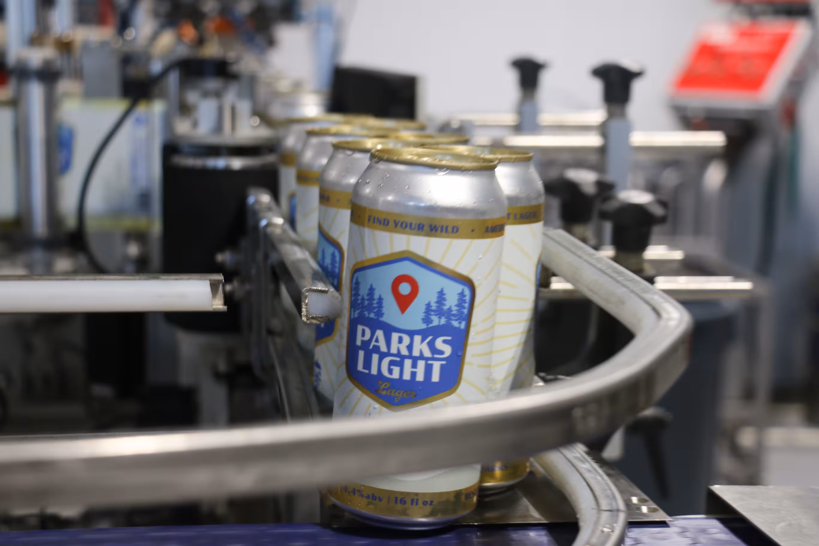 cans on a conveyor belt
