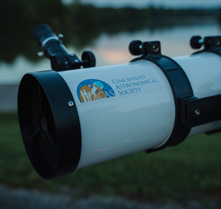 a telescope with a logo on it